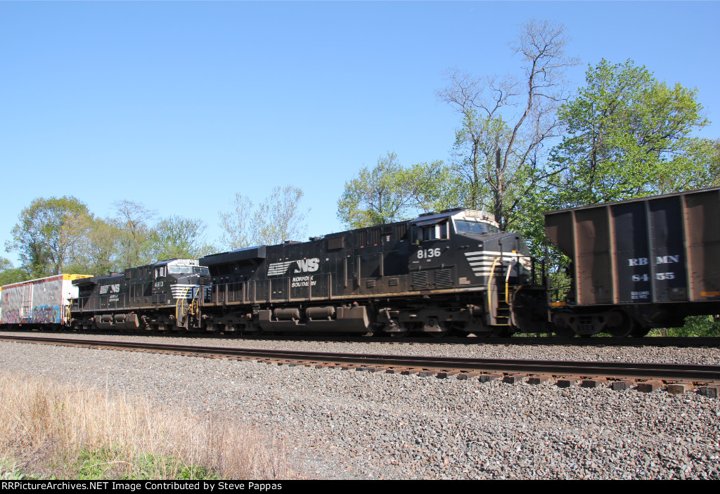 NS 8136 and 4813 as mid-train DPUs heading west through Cove PA